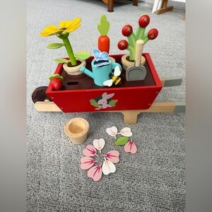 Tender leaf wooden garden play set w/red barrel. VG condition. $45